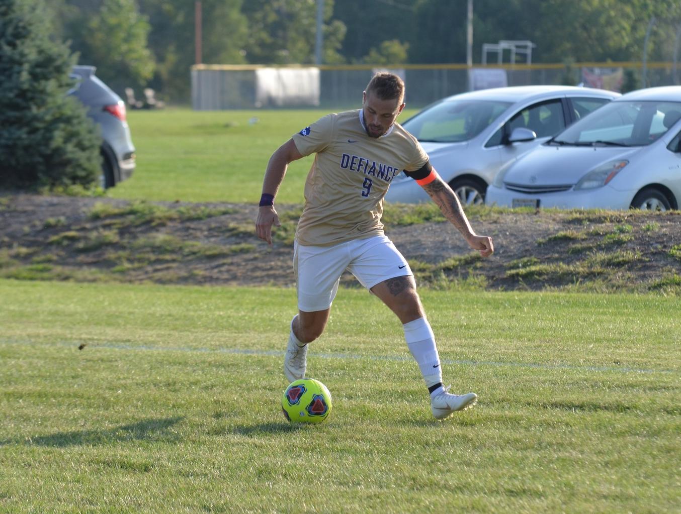 Yellow Jacket Offense Slowed by Trine