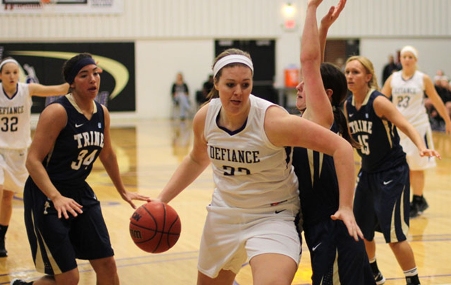 Trine Hands Yellow Jackets Fourth-Straight Loss with 65-57 Defeat